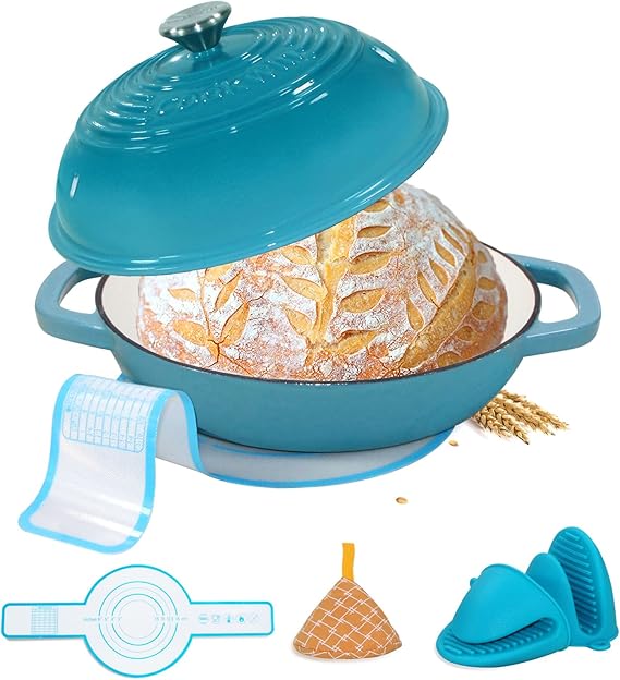 Cookwin teal enameled cast iron bread oven with loaf and baking accessories